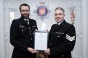 Commended - Dep Chief Con Andy Prophet presents Sgt Rob Partridge with his certificate