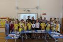 Otterhampton Primary School's year six pupils spent time working with Andrew Powell-Thomas and residents to create the book