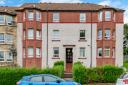 The flat also features a modern and spacious fitted kitchen