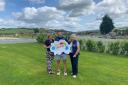 Lingen Davies Mid Wales Colour Run Lisa Hughes, Jonathan Williams, and Rhiannon Jones at Meadow Springs