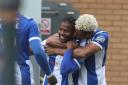 Levelling up - Owura Edwards celebrates with Lyle Taylor after equalising for Colchester United against Bromley