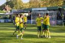 Hitchin Town celebrate Coree Wilson's penalty. Picture: PETER ELSE