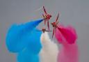 The Red Arrows display team in action at the Duxford Summer Air Show at IWM Duxford.