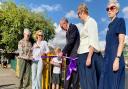 Daisy, who won an art competition, and the Mayor of Saffron Walden cut a ribbon to open the Golden Acre playground. Picture: Will Durrant