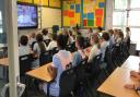 Class 5 at Linton Heights warm up for a record-breaking singalong accompanied by Billy Ocean. Picture: Linton Heights Junior School