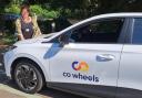 Annie with the Co Wheels electric car which is available to hire