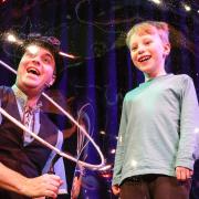 The Bubble Man creates a HUGE two-person bubble on stage