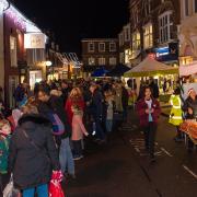 Charity stalls on King Street, Saffron Walden, taking part in Saffron Walden Initiative's late night Christmas shopping event