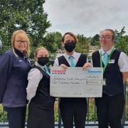 Tesco Saffron Walden store manager Dave Williams, Tesco community champion Susie Diggons and some staff from Cafe Cornell.