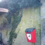 The sign is designed to guide people towards the footpath through the gates into the Audley End estate