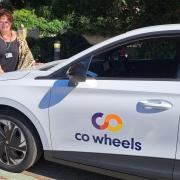 Annie with the Co Wheels electric car which is available to hire