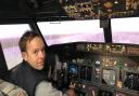 Professional snooker player Ali Carter in the flight simulator