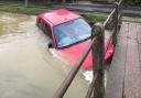 The car submerged in floodwater in Clavering