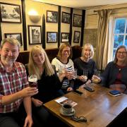 Members of the Ickleton Lionhearted group celebrating in a neighbouring pub