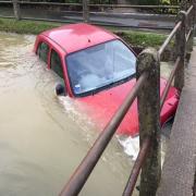 The car submerged in floodwater in Clavering