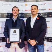 (L-R) Oliver Pottrill, managing director being presented the award by Jason Fox of Channel 4’s TV show SAS - Who Dares Wins