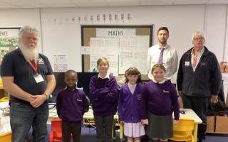 (L-R) Anthony Abery, WW1 Aviation Heritage Trust volunteer, Wimbish Primary Academy pupils, Chris Steadman, senior class teacher, and Cllr Stewart Luck