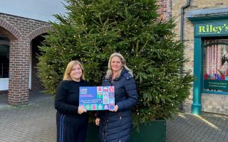 Vice chair of the BID Julie Redfern with BID manager Lisa Cleaver at the tree